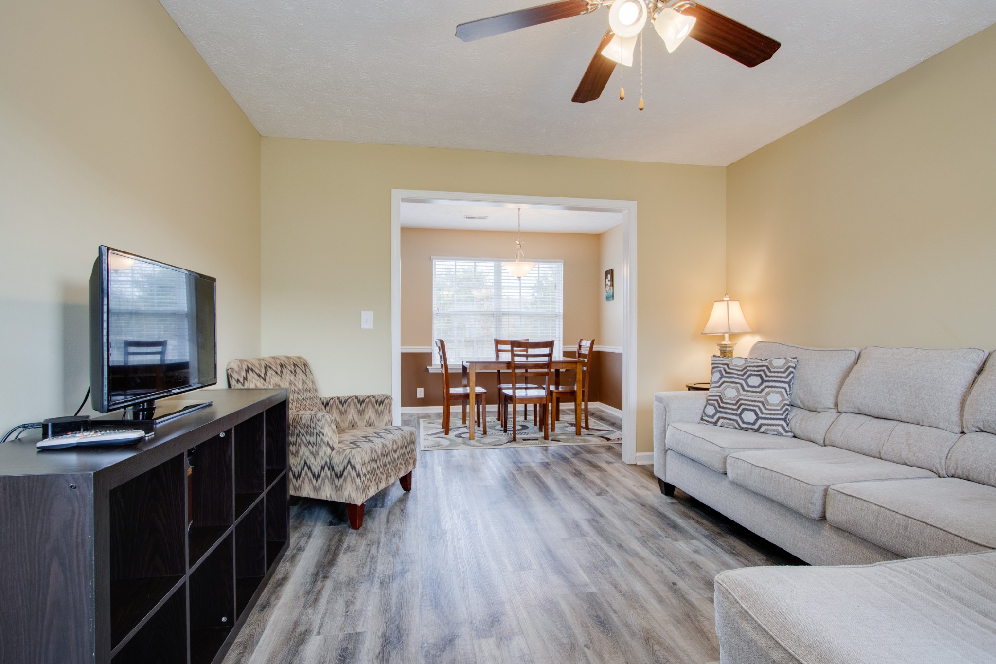 977 Woodall Road Lebanon, TN 37090 - Photo 6 of 32 a living room with furniture and a flat screen tv