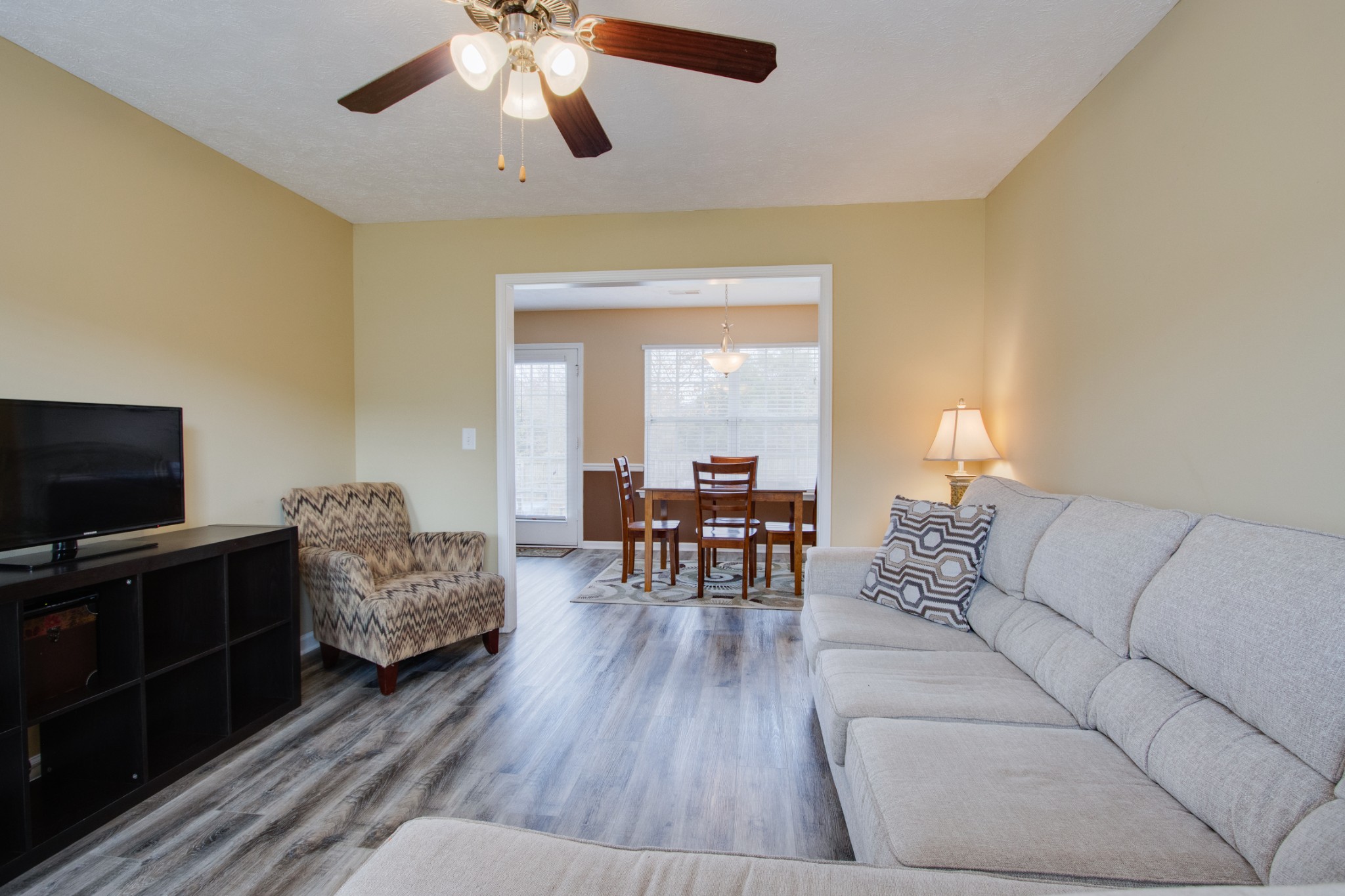 977 Woodall Road Lebanon, TN 37090 - Photo 7 of 32 a living room with furniture and a flat screen tv