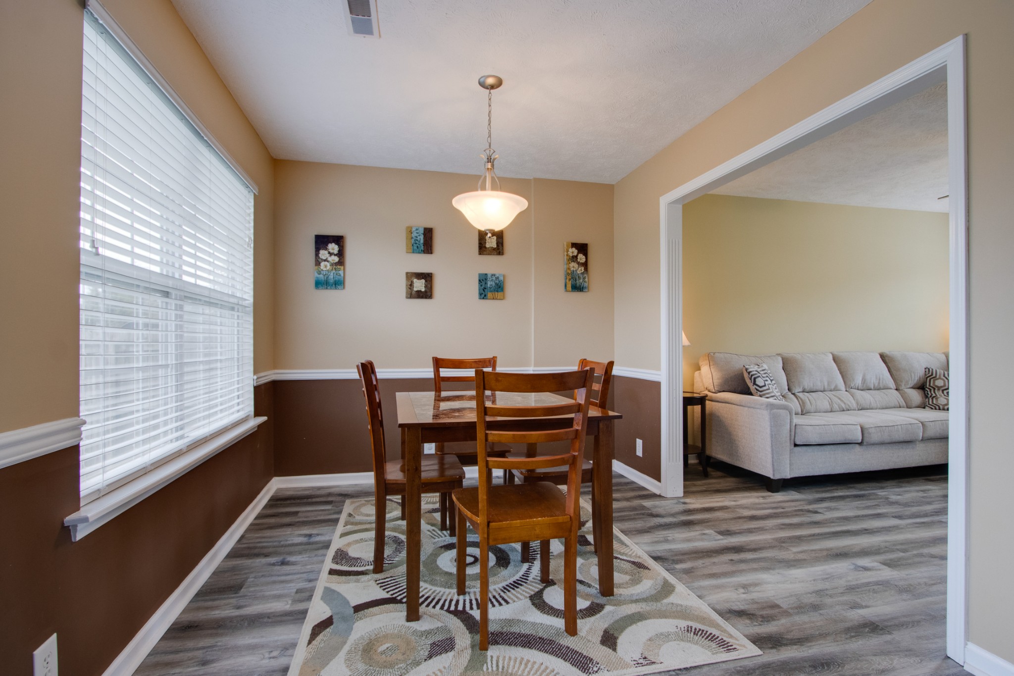 977 Woodall Road Lebanon, TN 37090 - Photo 10 of 32 a view of a dining room with furniture window and wooden floor