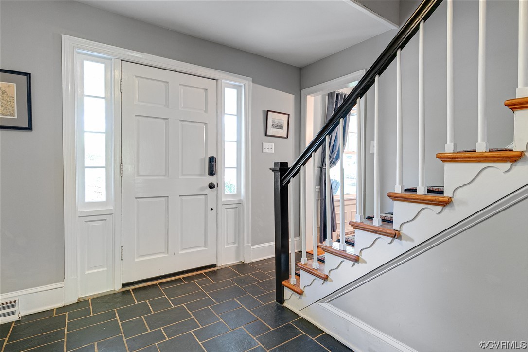 4647 Arrowhead Road Richmond, VA 23235 - Photo 8 of 48 a view of an entryway with wooden floor and staircase