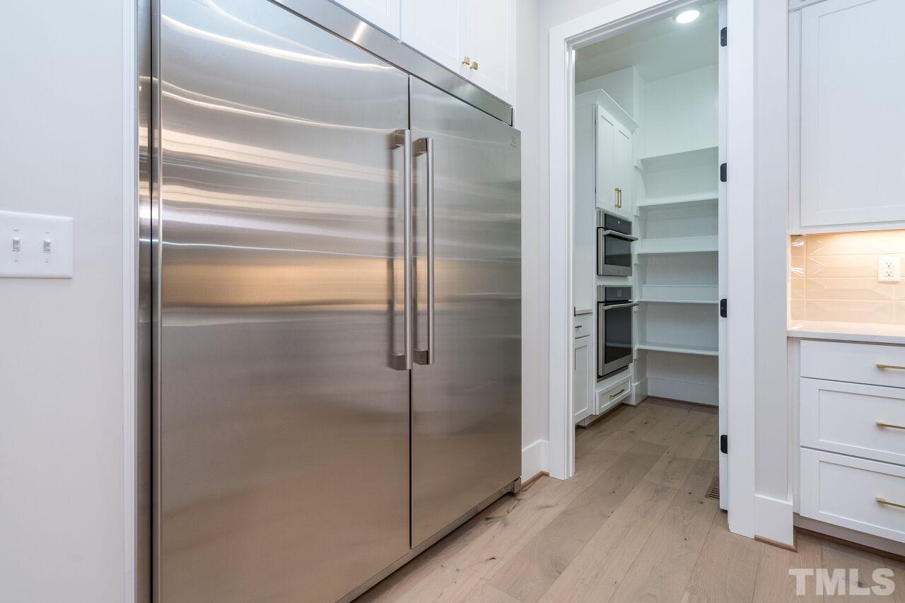 1220 Explorer Trail Wake Forest, NC 27587 - Photo 19 of 49 a bathroom with a shower and a glass door