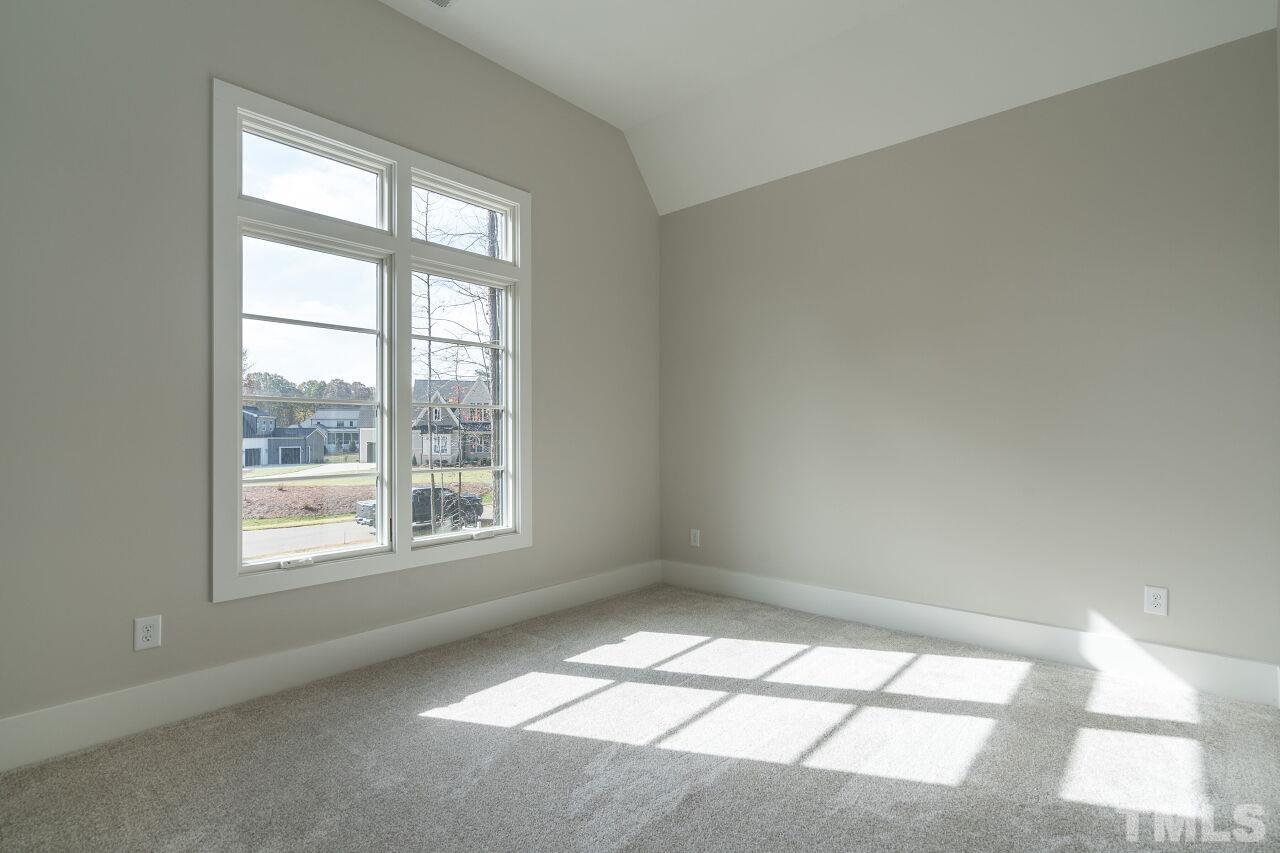 1220 Explorer Trail Wake Forest, NC 27587 - Photo 39 of 49 a view of an empty room with a window
