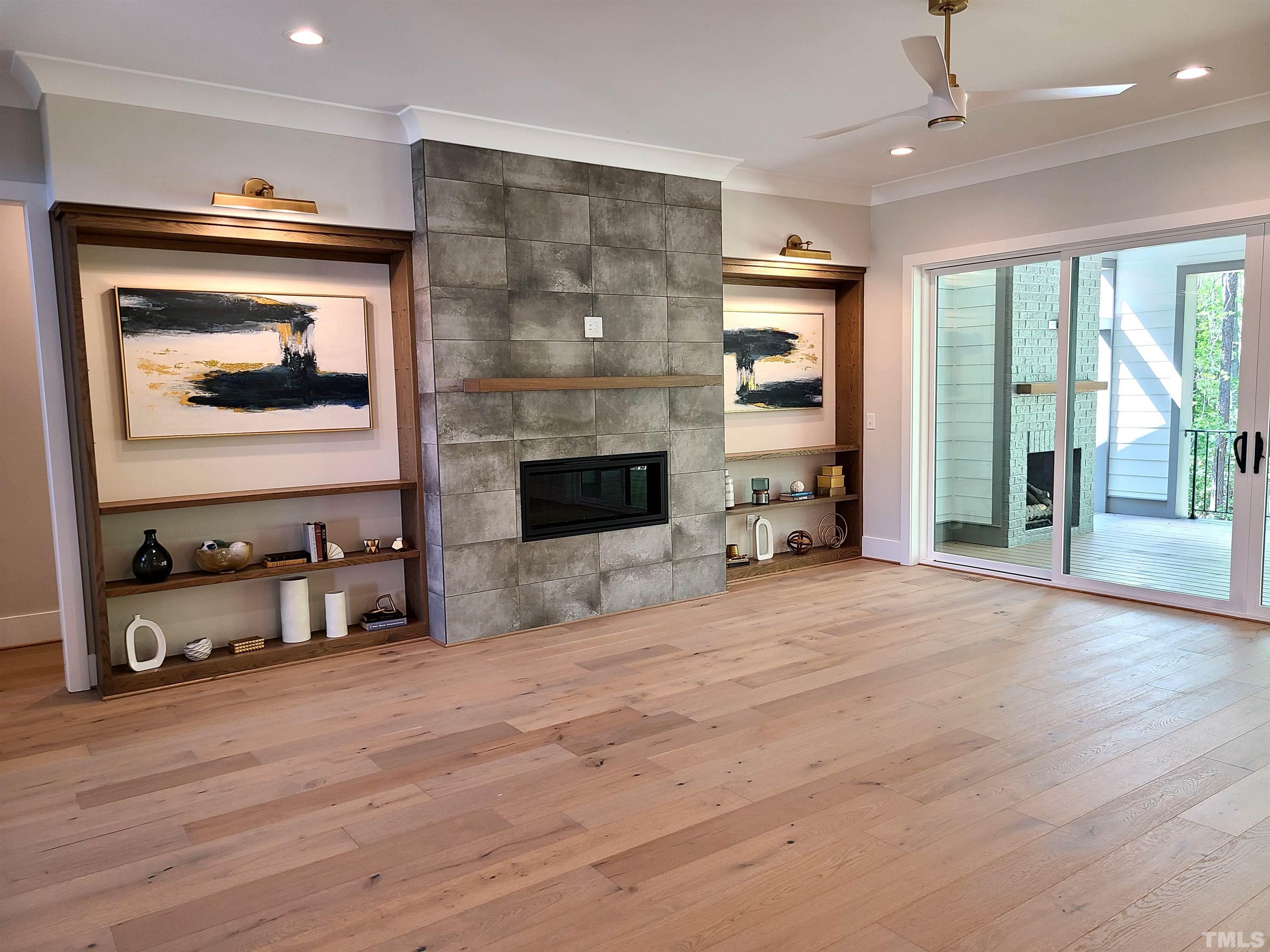 1220 Explorer Trail Wake Forest, NC 27587 - Photo 9 of 49 a living room with furniture and a fireplace