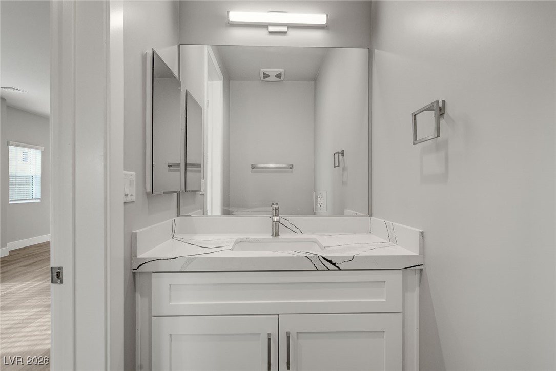 6503 Adrian Ridge Las Vegas, NV 89149 - Photo 18 of 59 Downstairs Half Bathroom