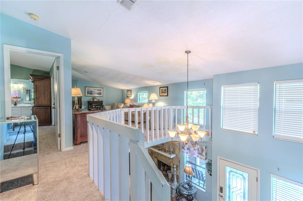 39 Cherokee Trail Ormond Beach, FL 32174 - Photo 14 of 35 a dining room with furniture entryway and wooden floor