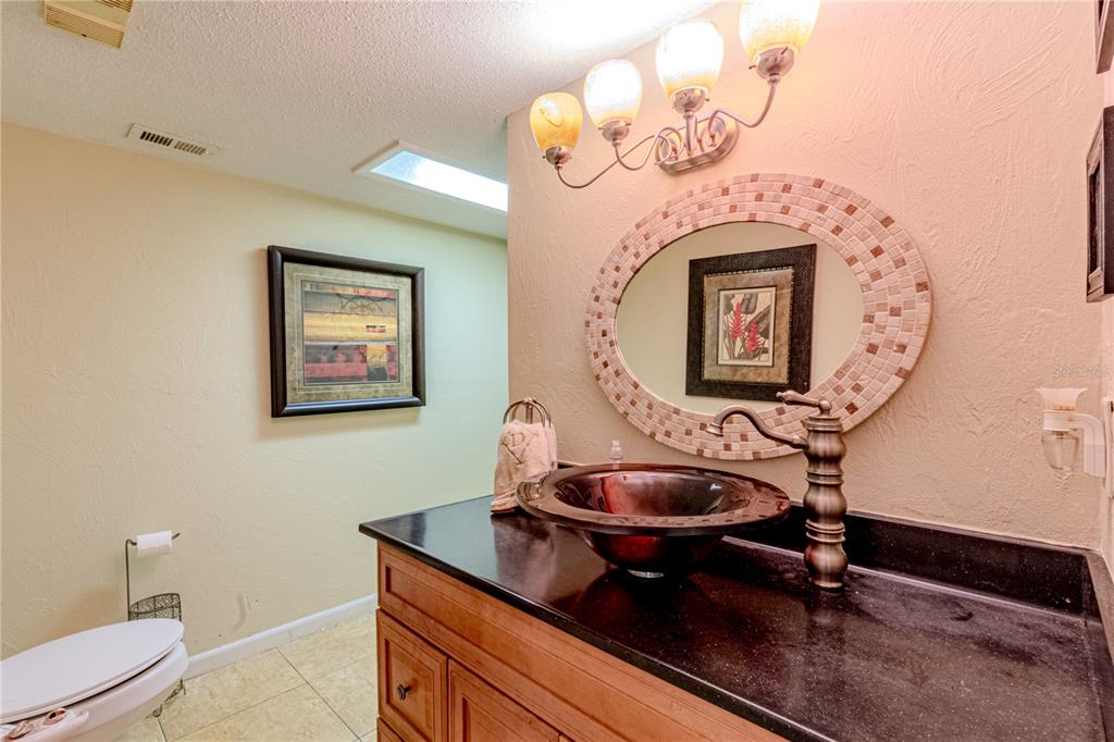 39 Cherokee Trail Ormond Beach, FL 32174 - Photo 26 of 35 a room with table and mirror