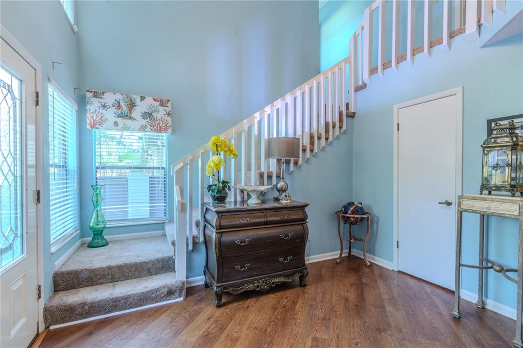 39 Cherokee Trail Ormond Beach, FL 32174 - Photo 4 of 35 a view of an entryway with wooden floor