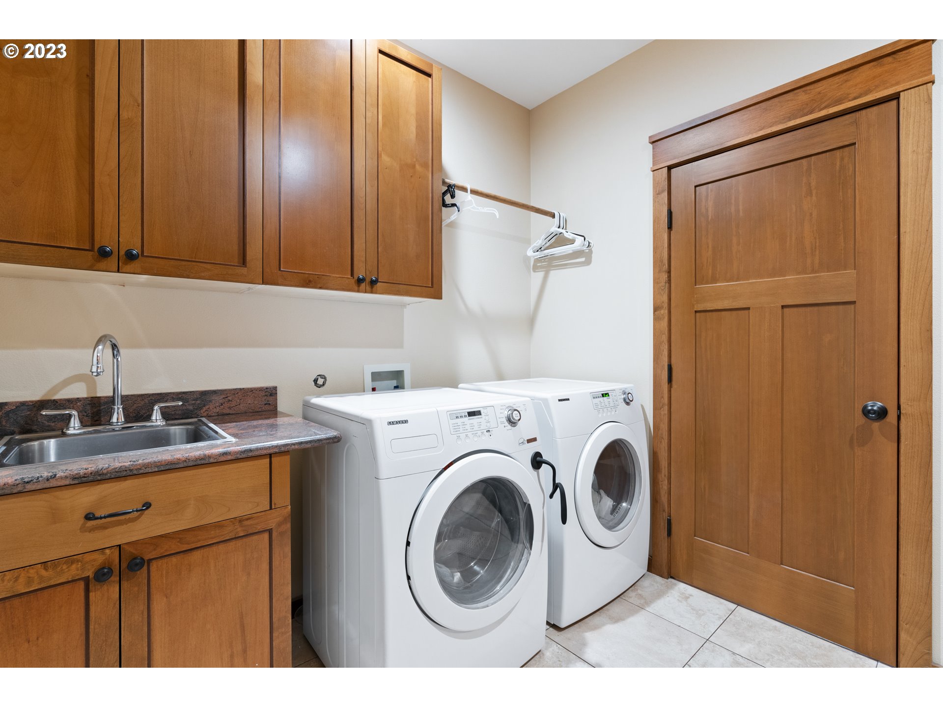 10534 Southeast Vradenburg Road Happy Valley, OR 97086 - Photo 14 of 39 a utility room with dryer and washer
