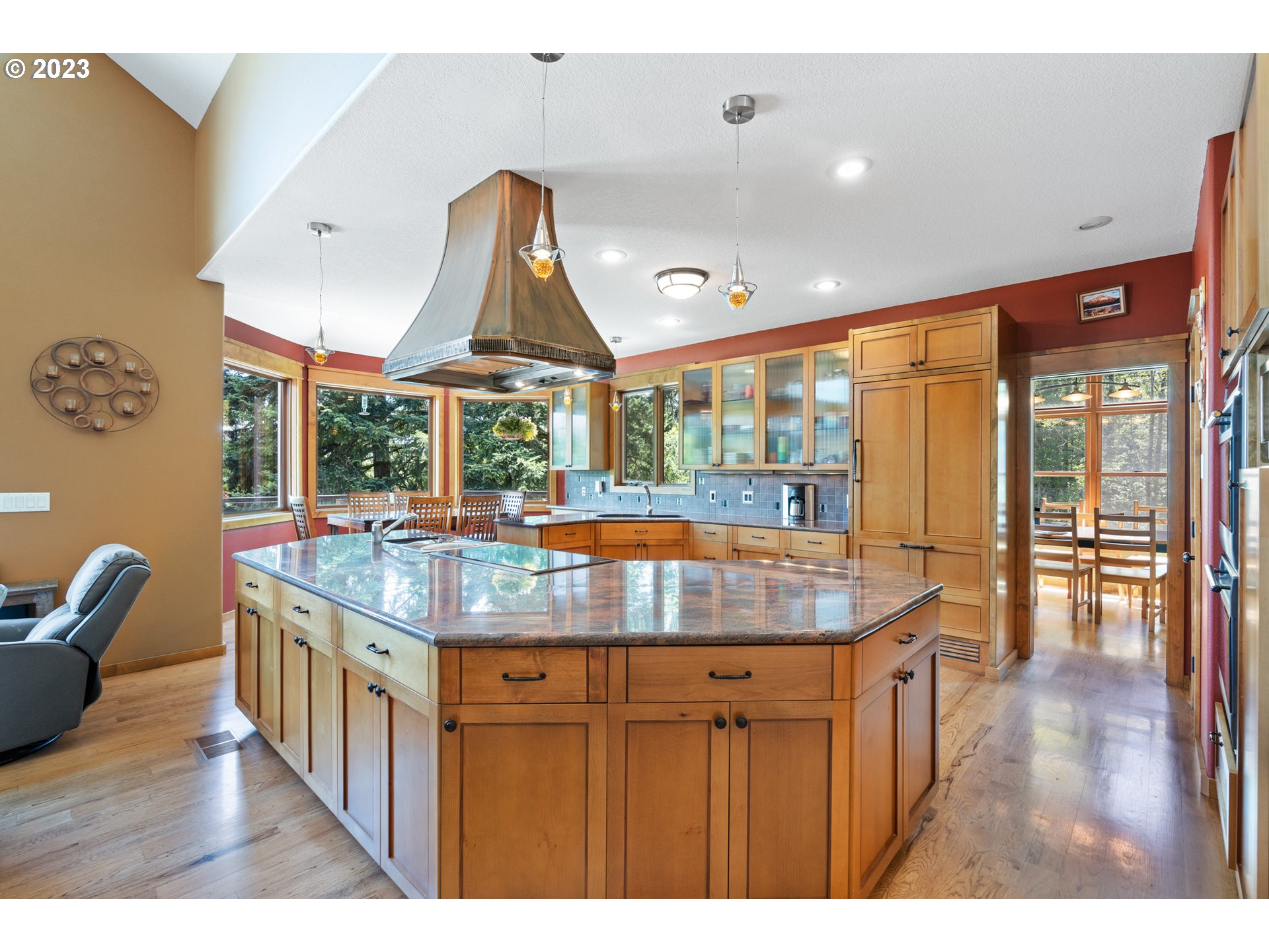 10534 Southeast Vradenburg Road Happy Valley, OR 97086 - Photo 17 of 39 a kitchen with stainless steel appliances granite countertop a kitchen island a stove and a sink