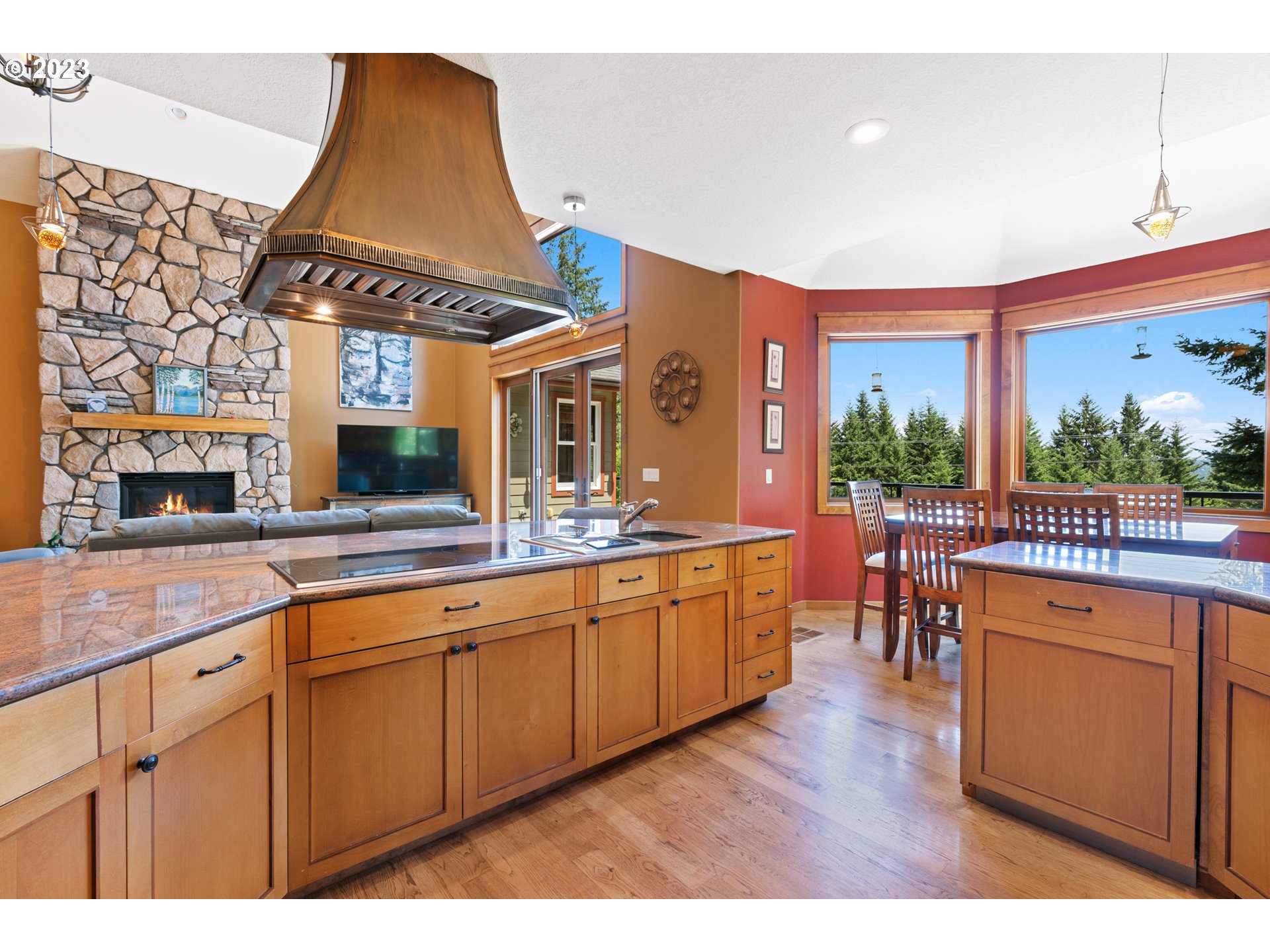 10534 Southeast Vradenburg Road Happy Valley, OR 97086 - Photo 21 of 39 a open kitchen with stainless steel appliances granite countertop a stove and cabinets