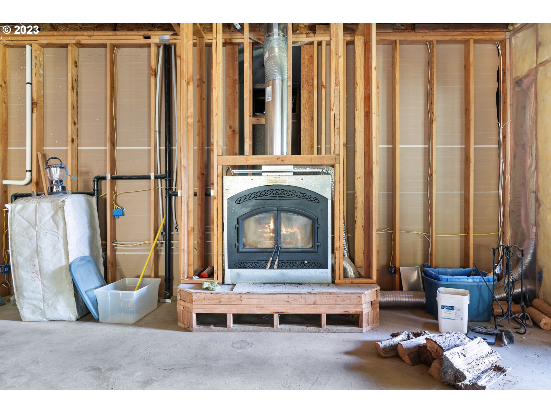 10534 Southeast Vradenburg Road Happy Valley, OR 97086 - Photo 29 of 39 a living room with furniture a large window and a fireplace