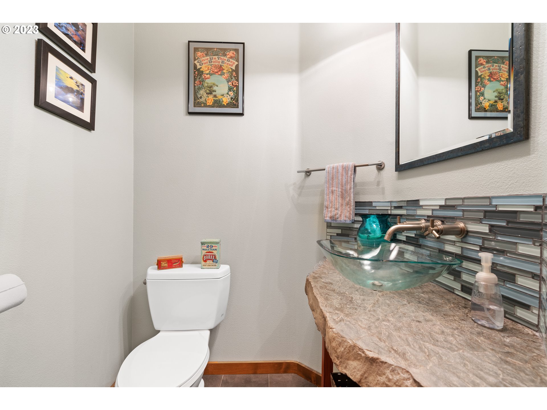 10534 Southeast Vradenburg Road Happy Valley, OR 97086 - Photo 33 of 39 a bathroom with a toilet a sink and mirror