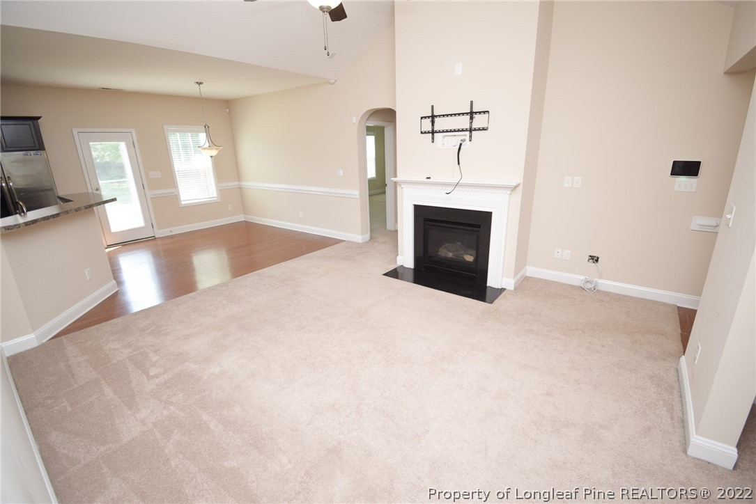 115 Snipe Court Raeford, NC 28376 - Photo 13 of 37 a view of a livingroom with a fireplace