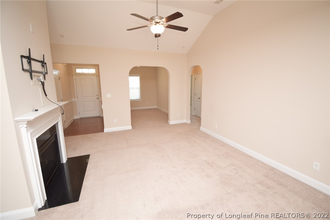 115 Snipe Court Raeford, NC 28376 - Photo 24 of 37 a view of a livingroom with furniture and a fireplace