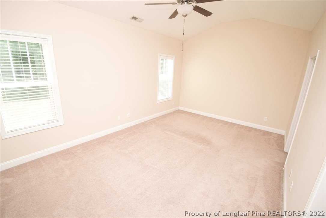115 Snipe Court Raeford, NC 28376 - Photo 25 of 37 a view of an empty room with a window