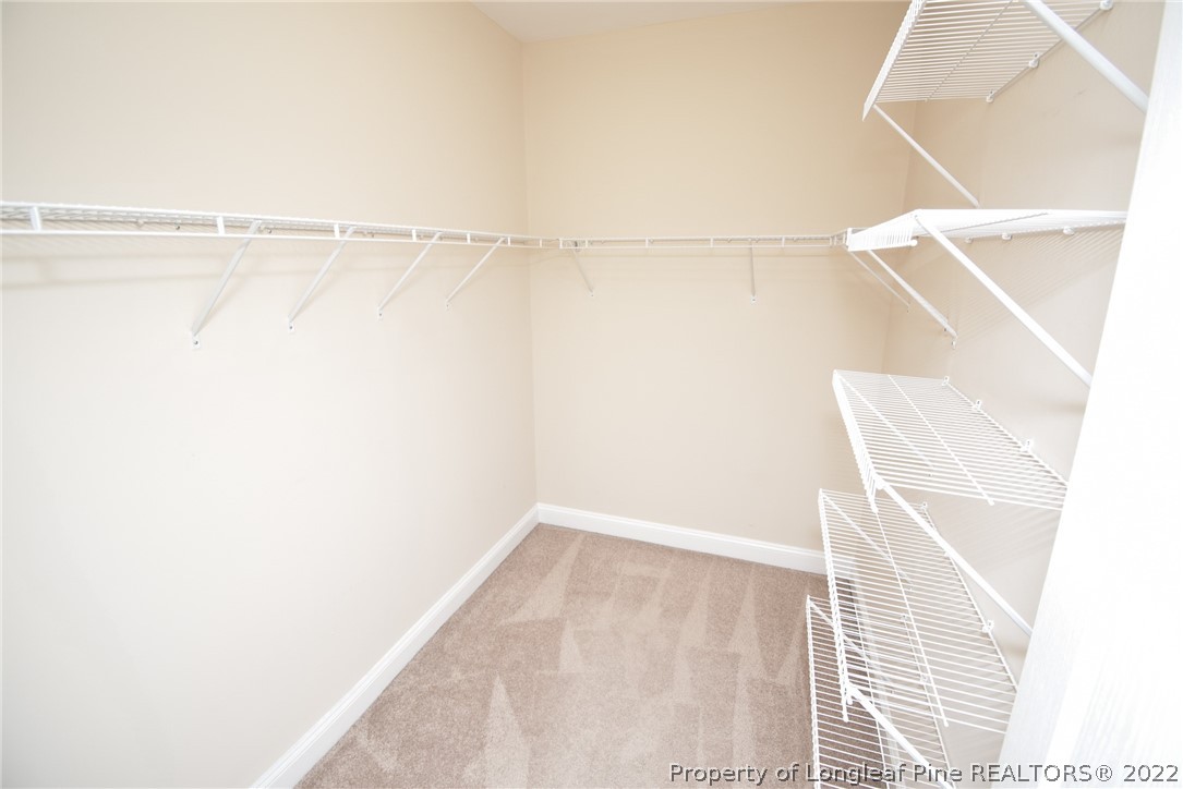 115 Snipe Court Raeford, NC 28376 - Photo 31 of 37 a view of small space with racks on the wall