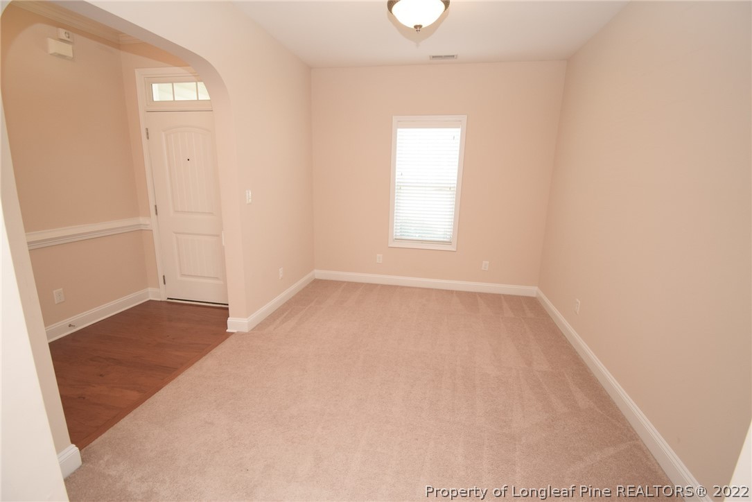 115 Snipe Court Raeford, NC 28376 - Photo 8 of 37 an empty room with windows