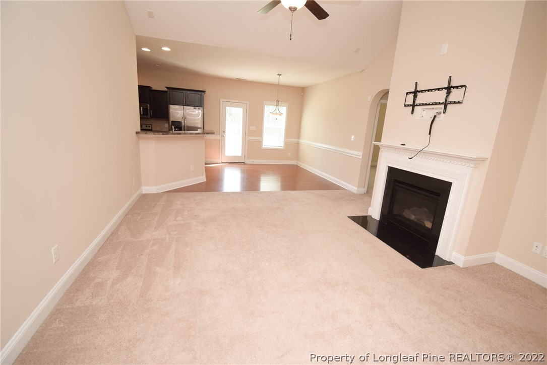 115 Snipe Court Raeford, NC 28376 - Photo 9 of 37 a view of a livingroom with a fireplace