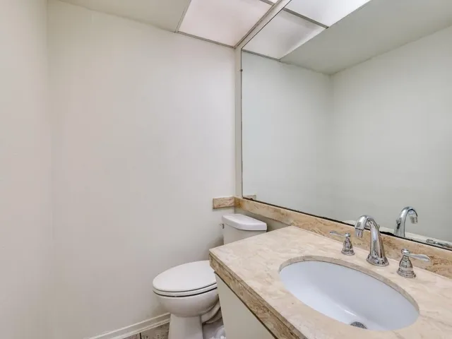 a bathroom with a sink and a toilet