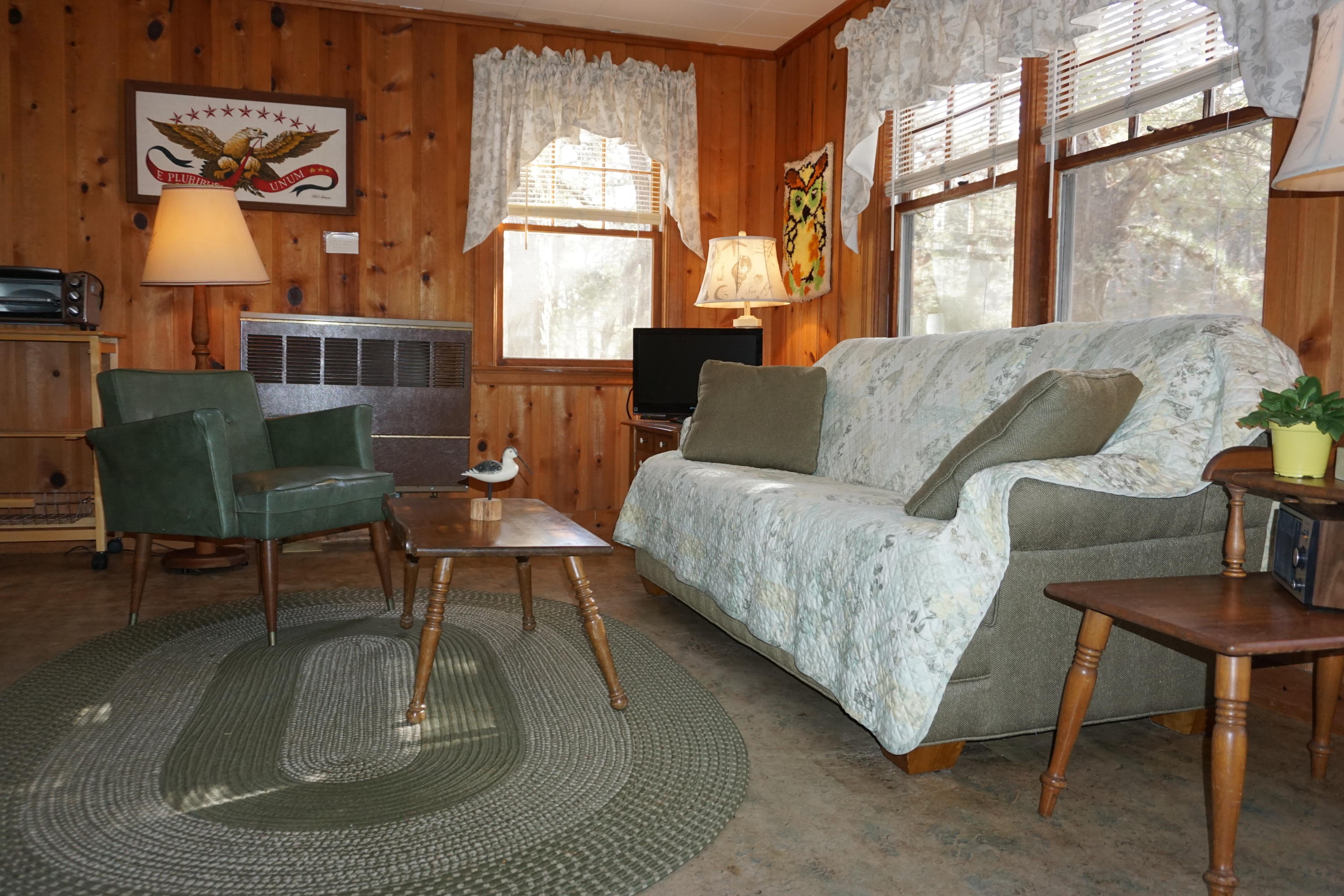 124 Castle Road, Unit 4 Truro, MA 02666 - Photo 12 of 20 a living room with furniture and a large window