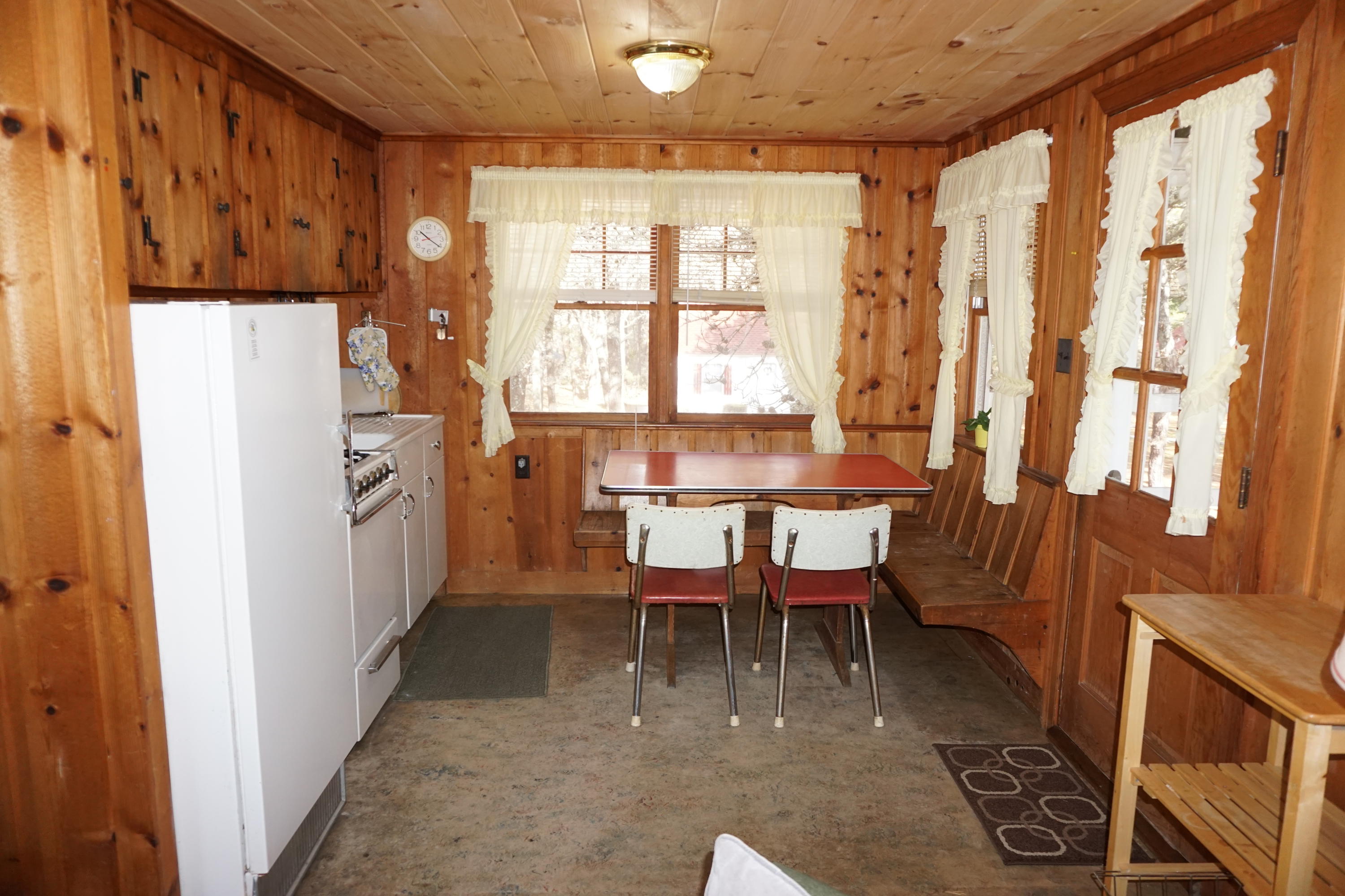 124 Castle Road, Unit 4 Truro, MA 02666 - Photo 13 of 20 a dining room with furniture and a window