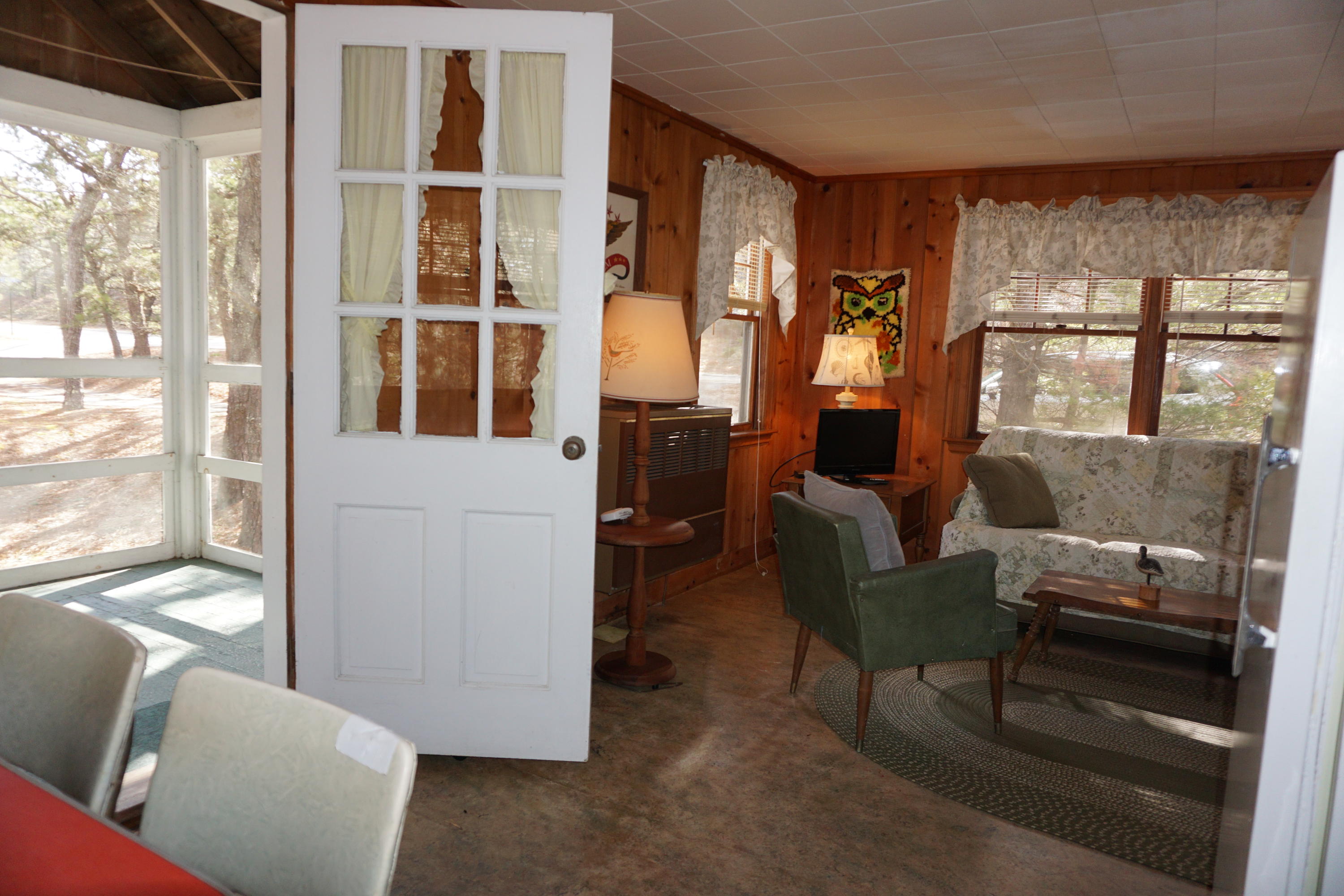124 Castle Road, Unit 4 Truro, MA 02666 - Photo 17 of 20 a living room with furniture and a window
