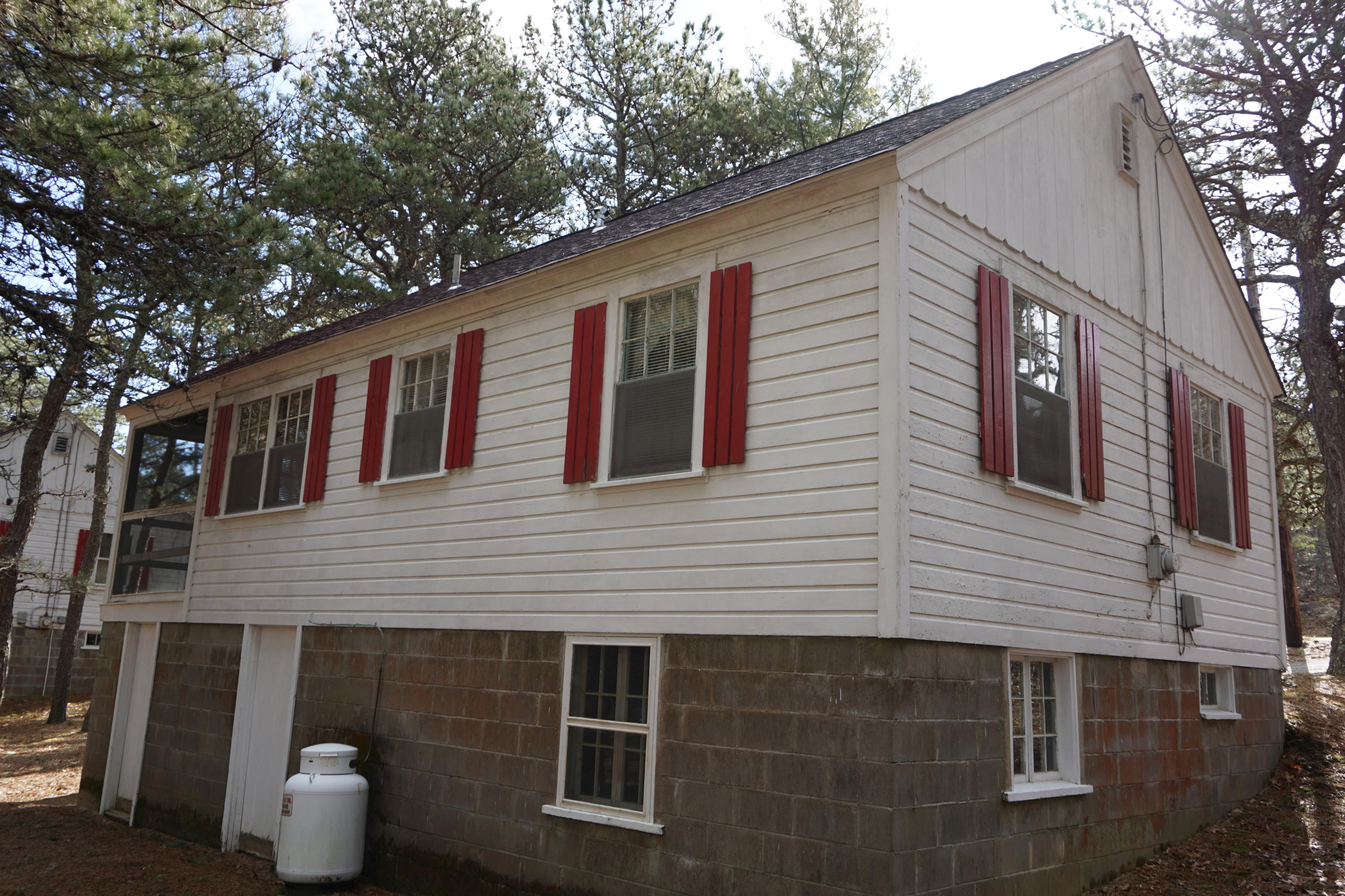 124 Castle Road, Unit 4 Truro, MA 02666 - Photo 19 of 20 a front view of a house with entryway