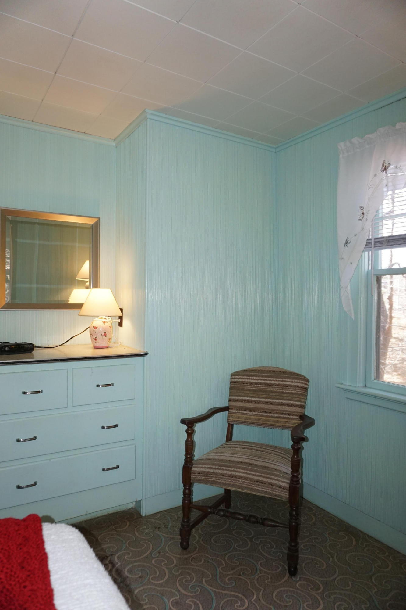 124 Castle Road, Unit 4 Truro, MA 02666 - Photo 7 of 20 a room with furniture and a lamp