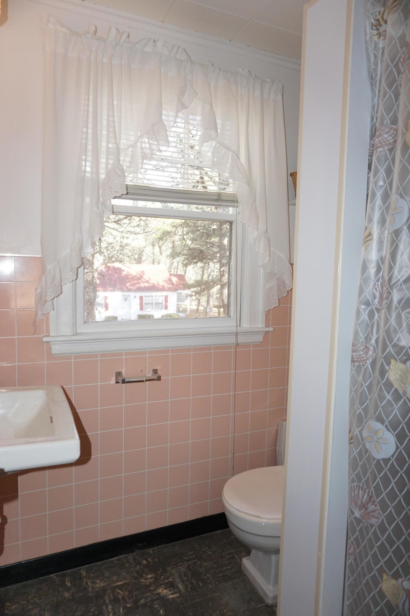 124 Castle Road, Unit 4 Truro, MA 02666 - Photo 10 of 20 a bathroom with a sink toilet and window