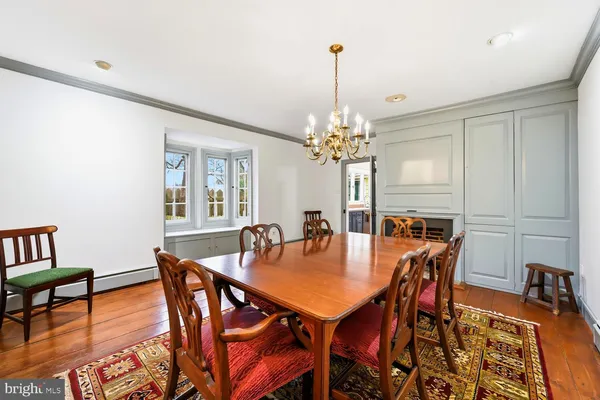a kitchen with stainless steel appliances a stove a sink dishwasher and a refrigerator