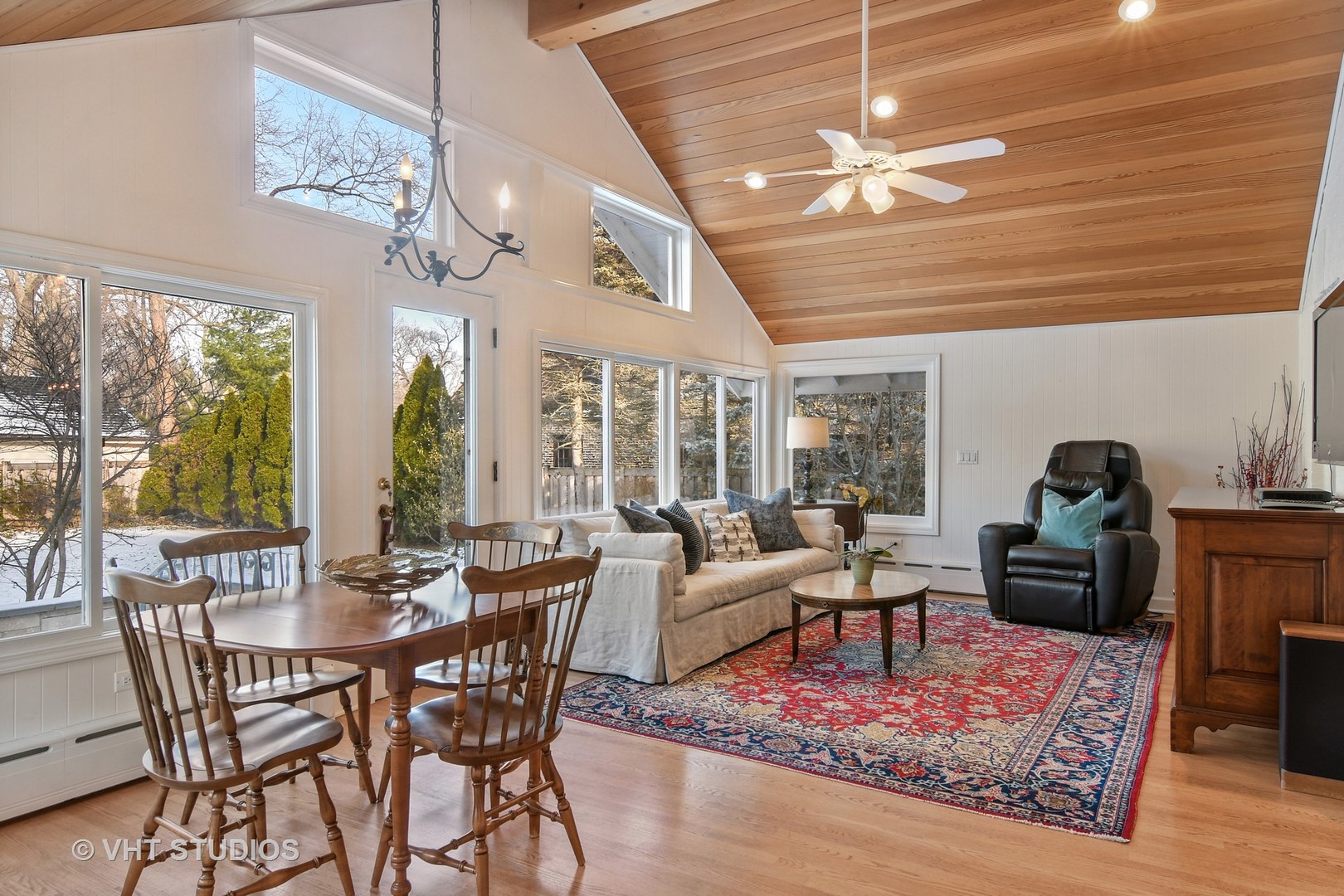 141 Robsart Place Kenilworth, IL 60043 - Photo 12 of 38 a view of a dining room with furniture large windows and wooden floor