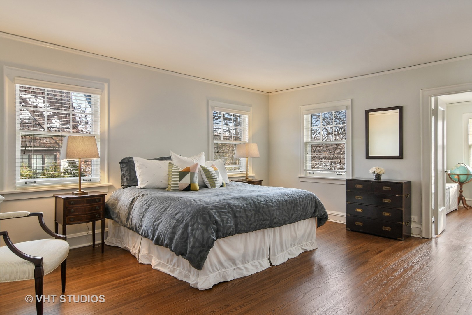 141 Robsart Place Kenilworth, IL 60043 - Photo 13 of 38 a bedroom with a bed and a table in it with window