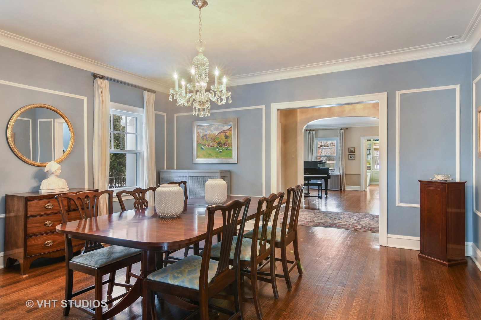 141 Robsart Place Kenilworth, IL 60043 - Photo 4 of 38 a view of a dining room with furniture a chandelier and wooden floor