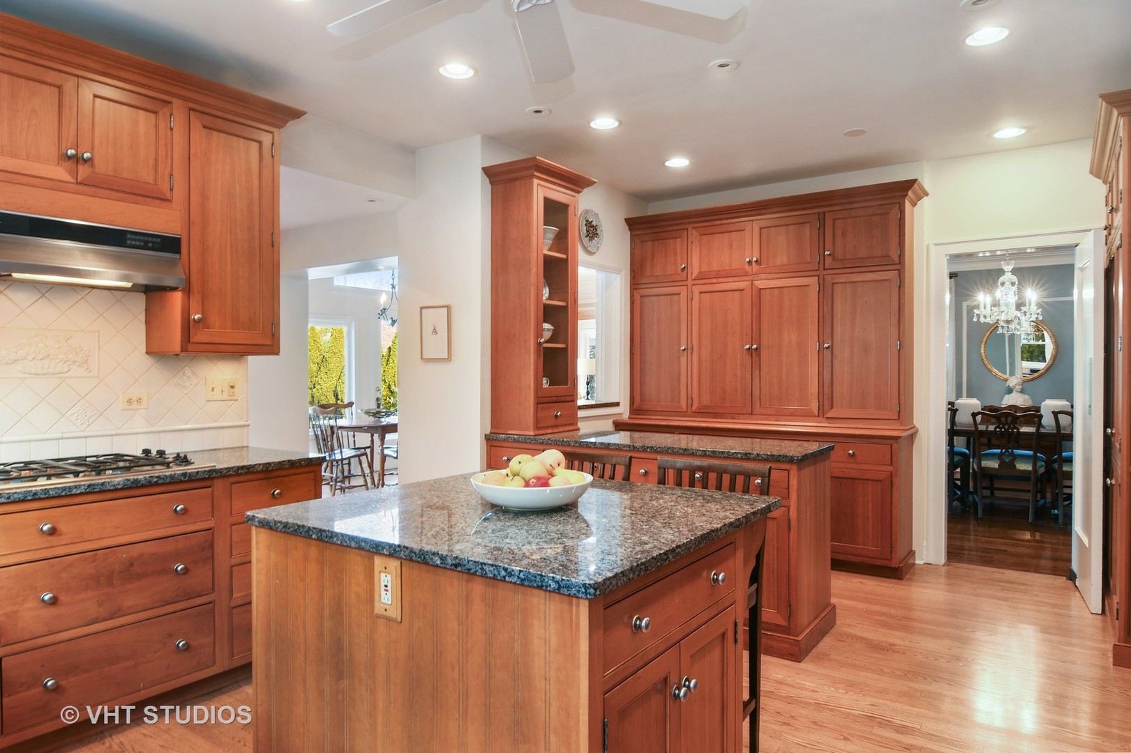141 Robsart Place Kenilworth, IL 60043 - Photo 9 of 38 a kitchen with granite countertop cabinets and sink