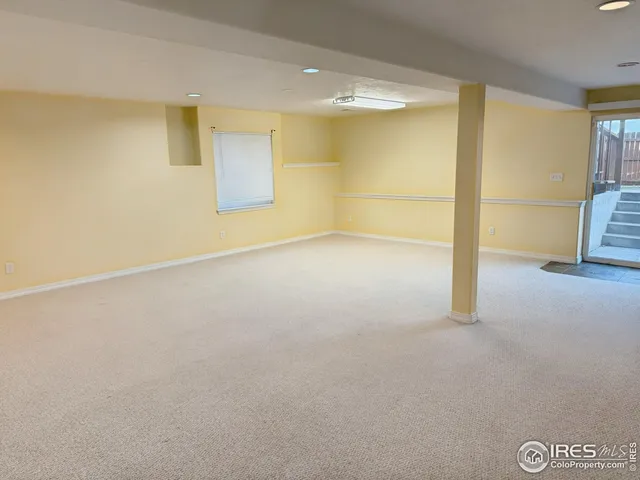 wooden floor and window in an empty room