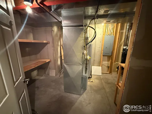 a view of an empty room and a window