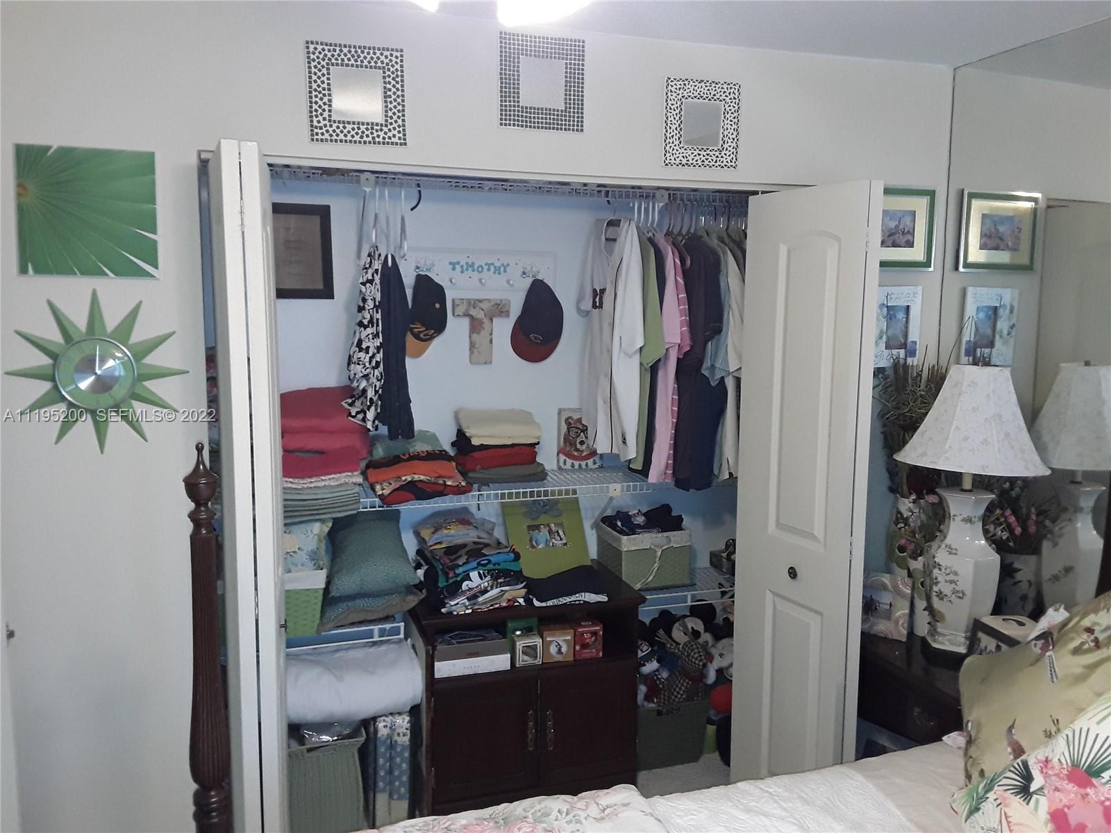 6810 Via Regina, Unit 40 Boca Raton, FL 33433 - Photo 30 of 45 Bedroom 1 Open Closet
