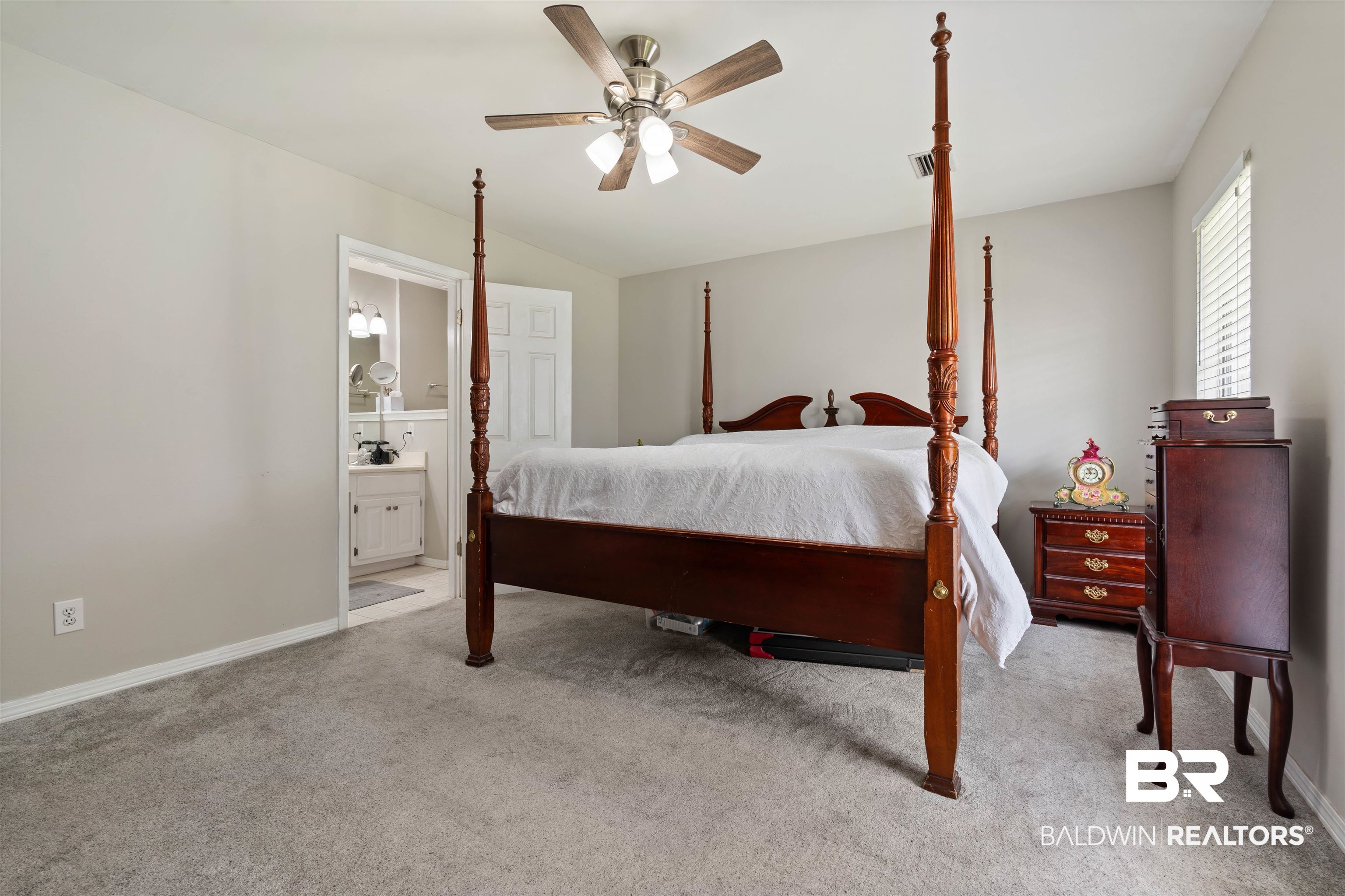 6457 Double Tree Court Mobile, AL 36695 - Photo 18 of 37 Carpeted bedroom featuring connected bathroom and ceiling fan