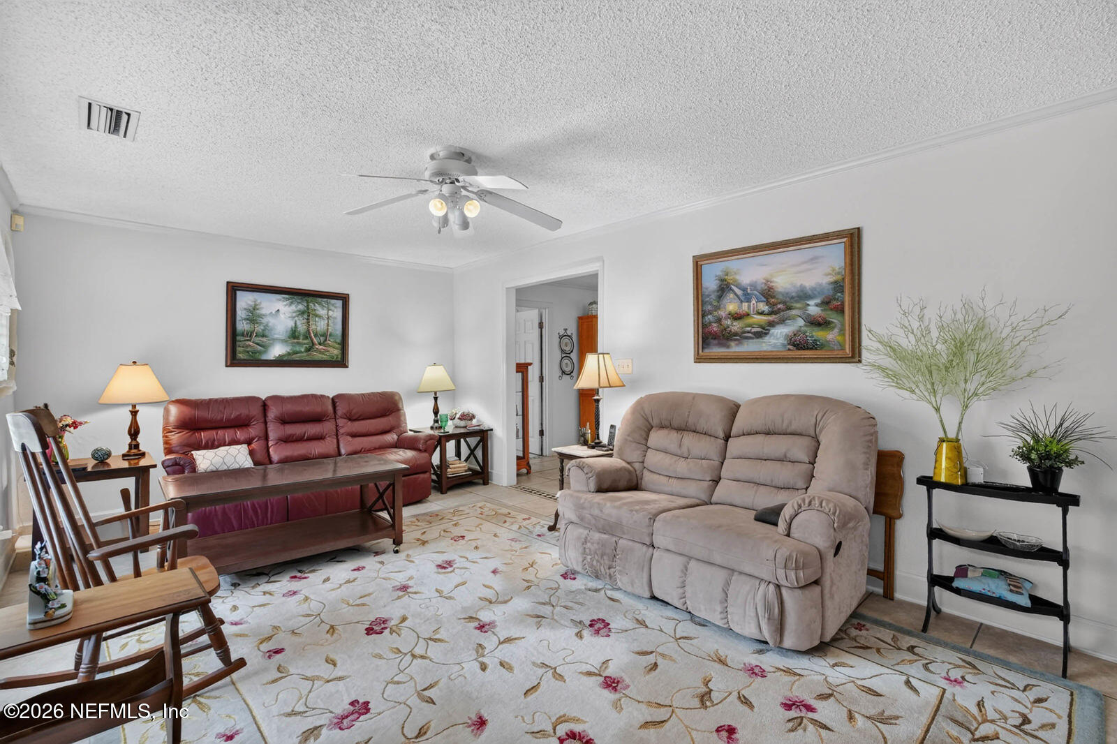 1950 Lightsey Road St. Augustine, FL 32084 - Photo 10 of 57 a living room with furniture and a lamp