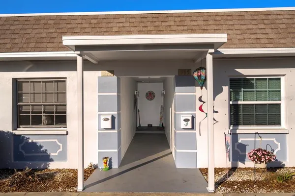 a view of a hallway with elevator