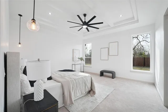 a bedroom with bed and a couch