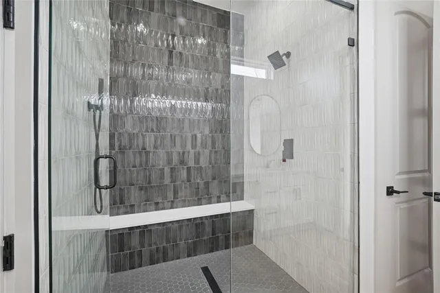 a bathroom with a sink a mirror and toilet