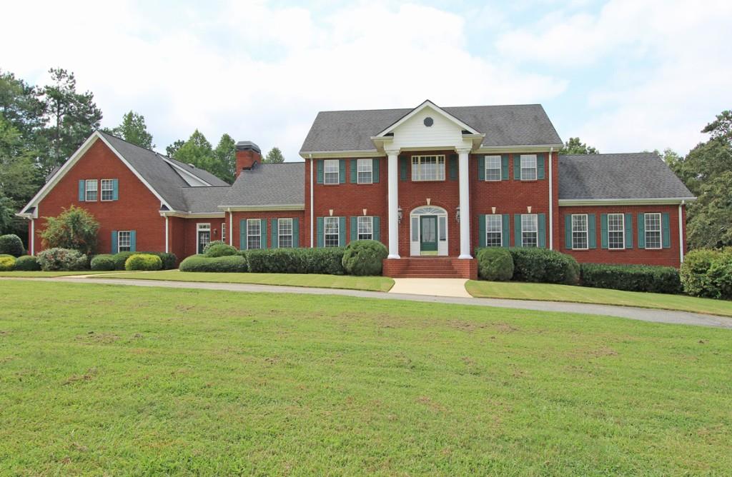 4062 Chattahoochee Road Cumming, GA 30041 - Photo 1 of 1 Four Sided Brick Home on 5 Acres