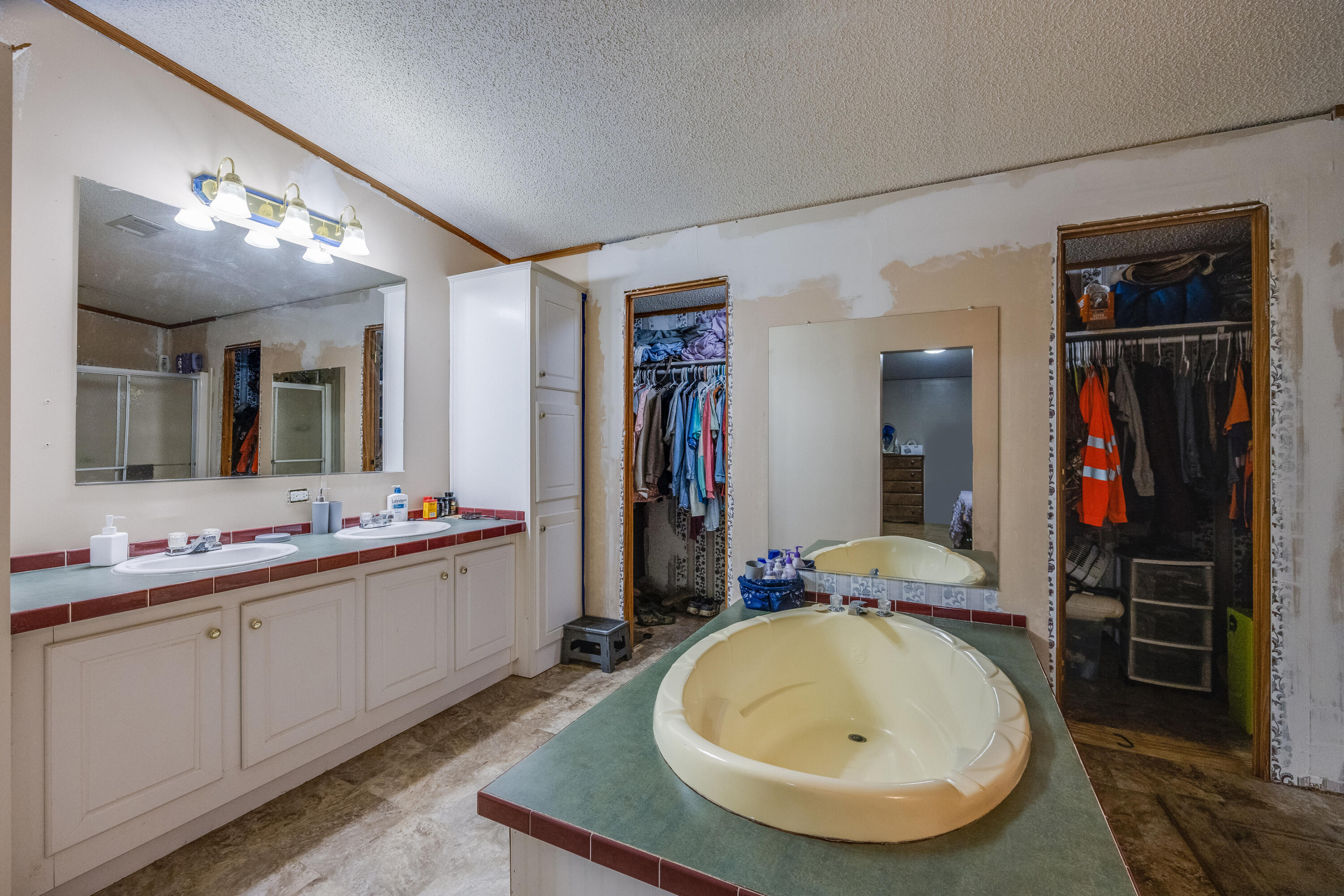 1953 Cotton Creek Road Baker, FL 32531 - Photo 18 of 38 a bathroom with a sink and a mirror