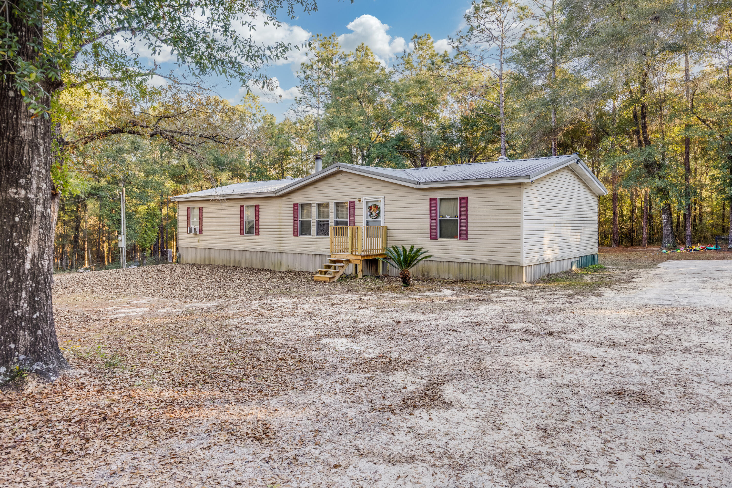 1953 Cotton Creek Road Baker, FL 32531 - Photo 2 of 38 a view of house with a outdoor space