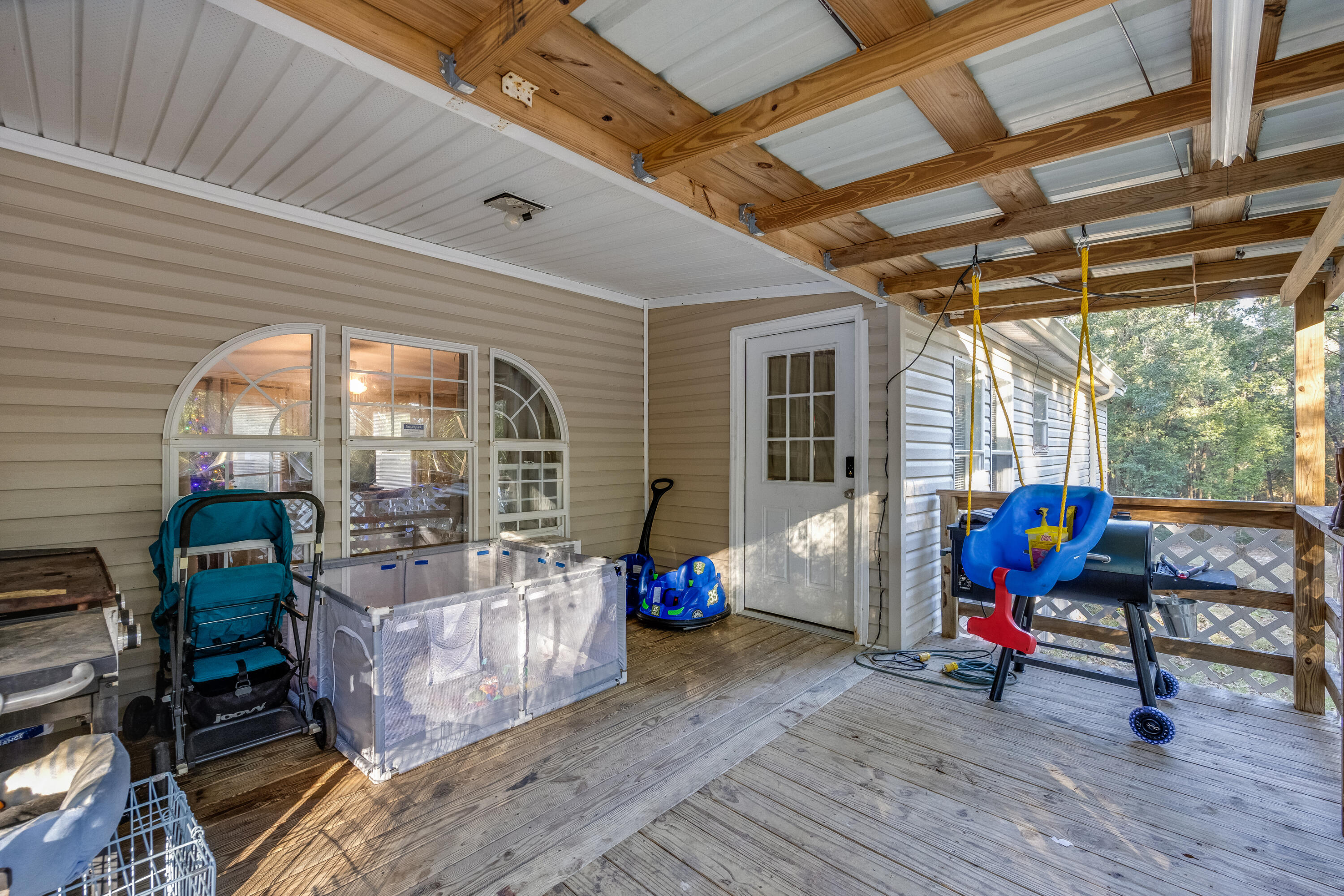1953 Cotton Creek Road Baker, FL 32531 - Photo 24 of 38 a living room with furniture and wooden floor