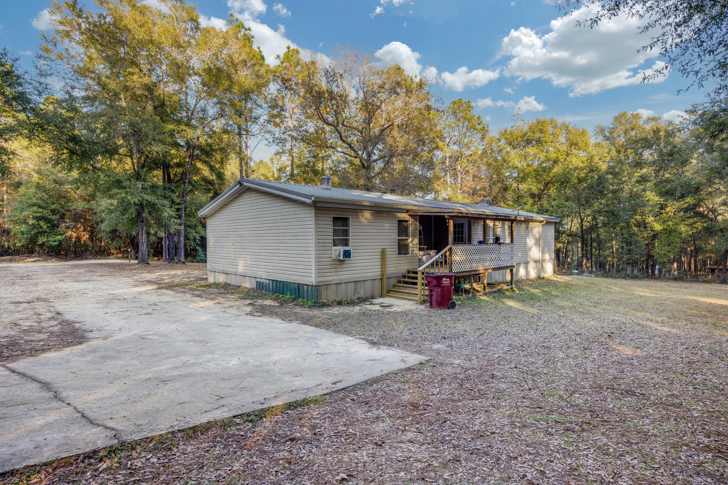 1953 Cotton Creek Road Baker, FL 32531 - Photo 26 of 38 a view of a house with backyard
