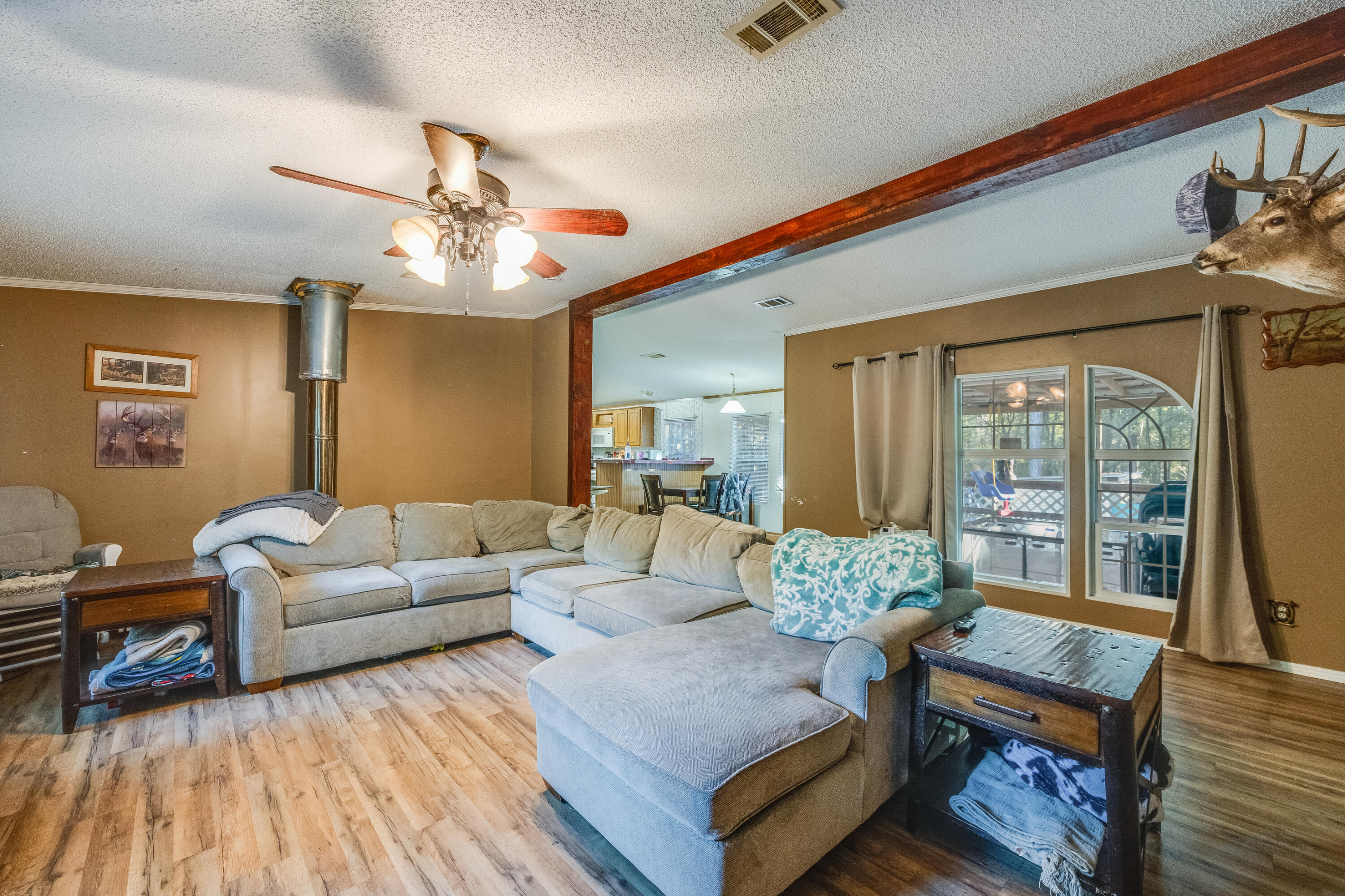 1953 Cotton Creek Road Baker, FL 32531 - Photo 5 of 38 a living room with furniture and wooden floor
