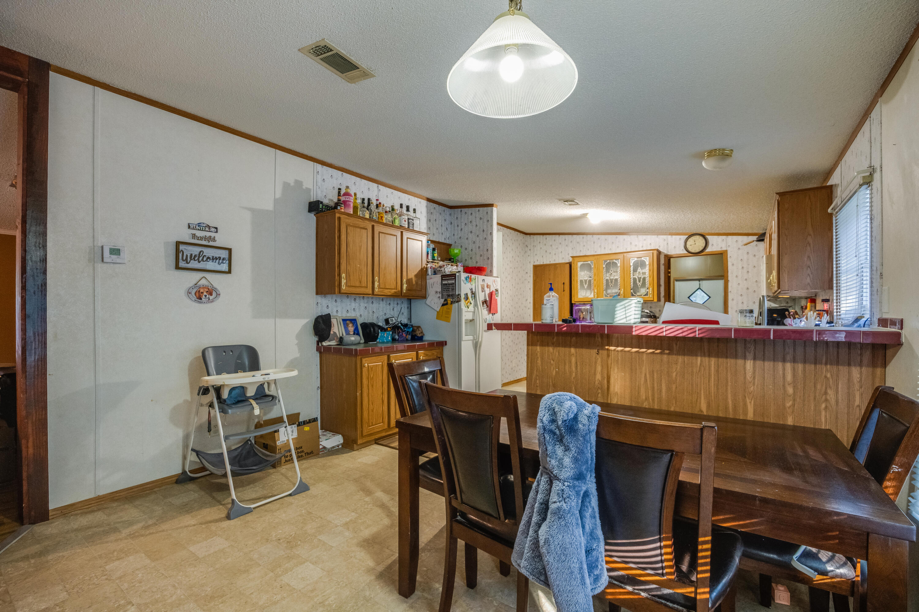 1953 Cotton Creek Road Baker, FL 32531 - Photo 9 of 38 a dining room with furniture and window