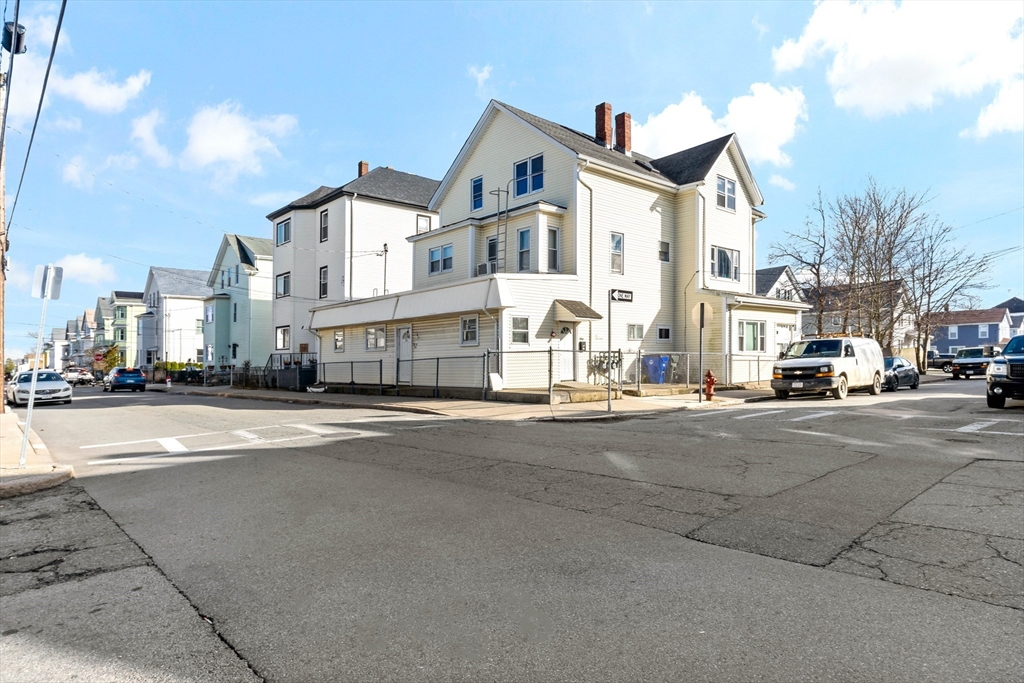 163 Warren Street Fall River, MA 02721 - Photo 1 of 39 a view of a city street with a building
